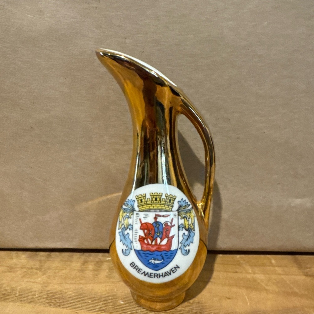 Vintage porcelain pitcher featuring the coat of arms of Bremerhaven, Germany
